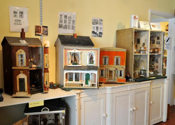 View of a selection of Dolls Houses in main museum room
